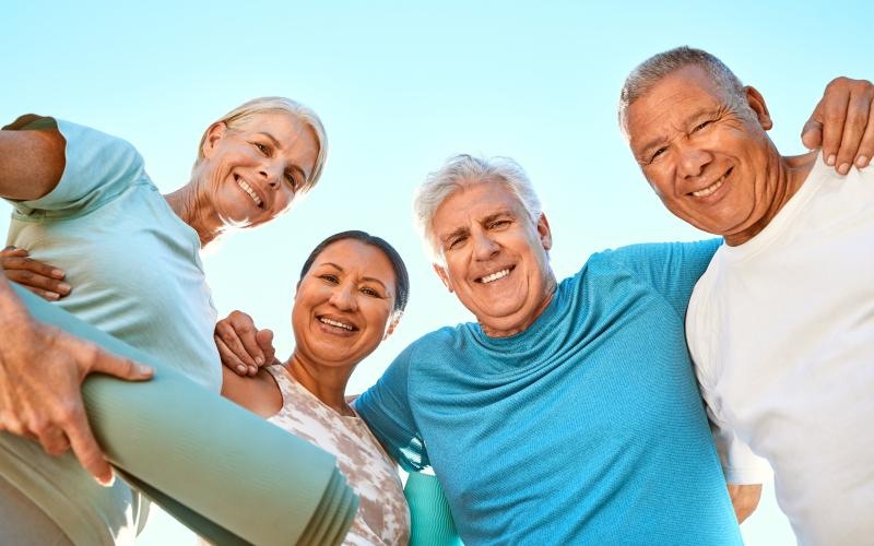 a group of people working out outside